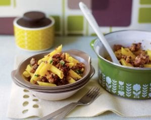 Ragu in bowl with serving spoon