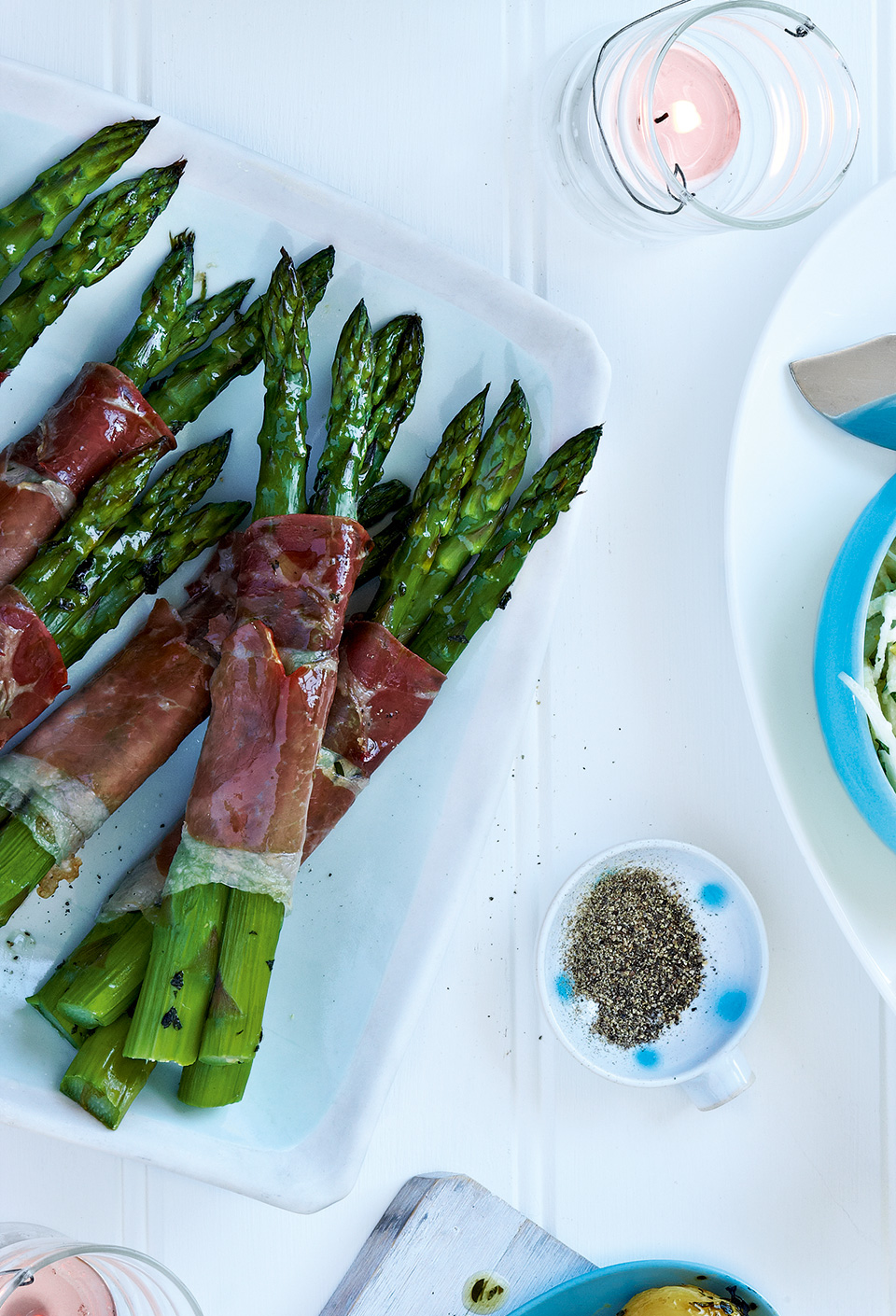 Roasted asparagus wrapped in Parma ham delicious. magazine