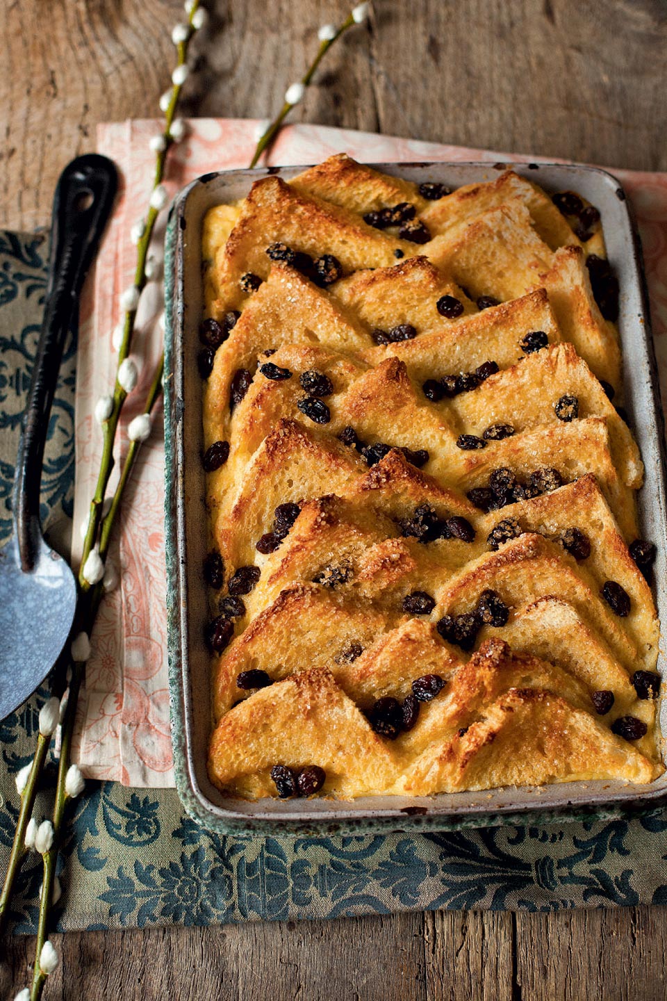 four-mini-pies-sitting-in-a-muffin-tin-on-a-marble-counter-top-ready