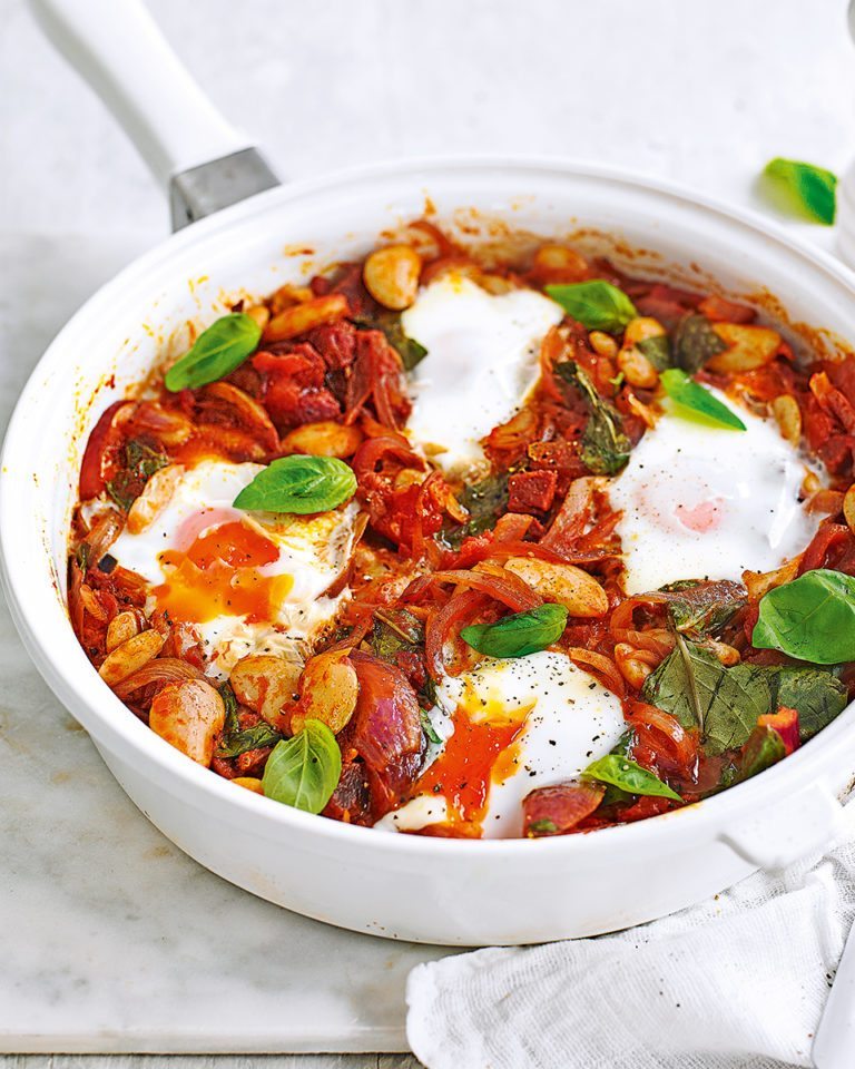 Baked eggs in spicy chorizo tomato sauce delicious. magazine