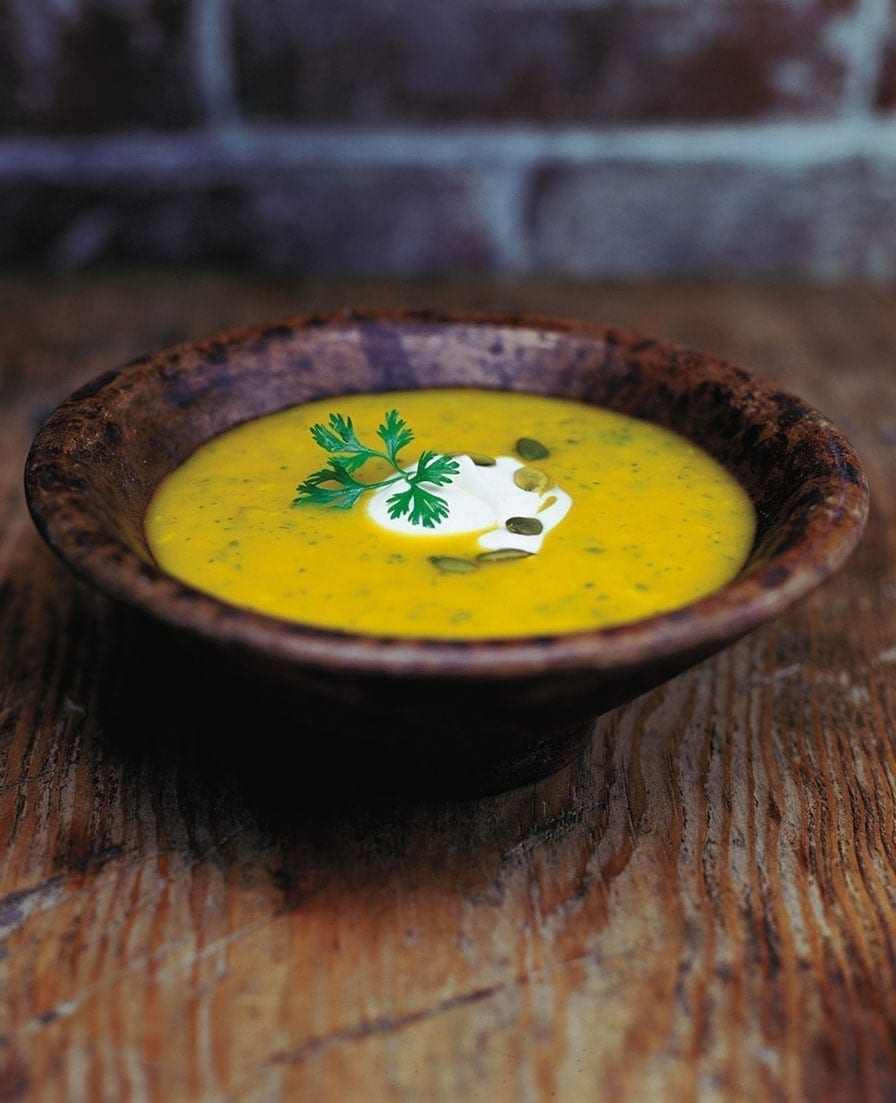 Pumpkin soup with pumpkin seed pesto recipe | delicious. magazine