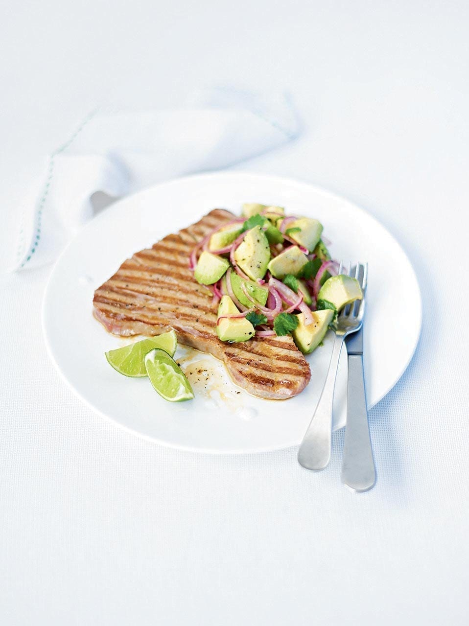 Tuna steaks with avocado and red onion salsa recipe | delicious. magazine