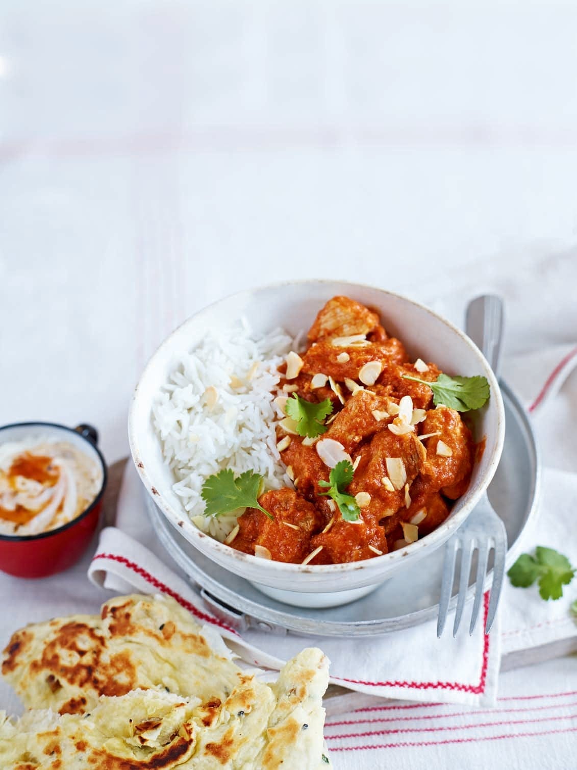 Pork madras with peshwari naan and mango yogurt recipe | delicious ...