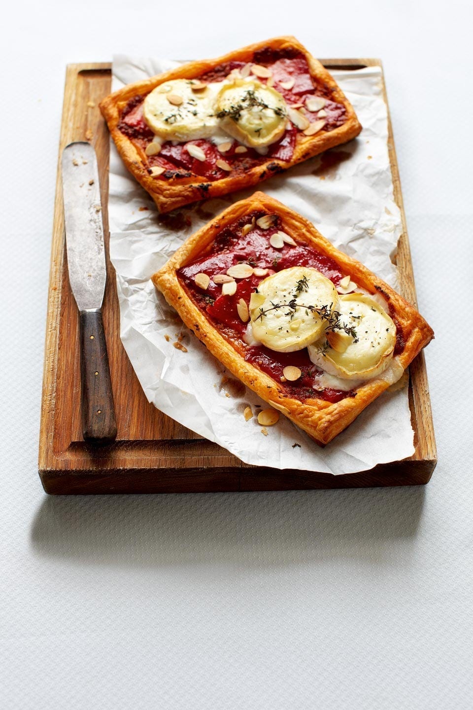 Cheat's red pepper and goat's cheese tarts recipe delicious. magazine