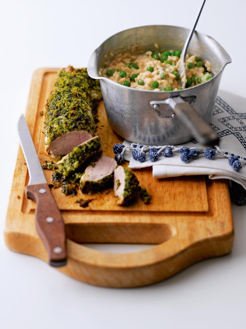 Herby roast pork with pea and ricotta risotto recipe | delicious. magazine
