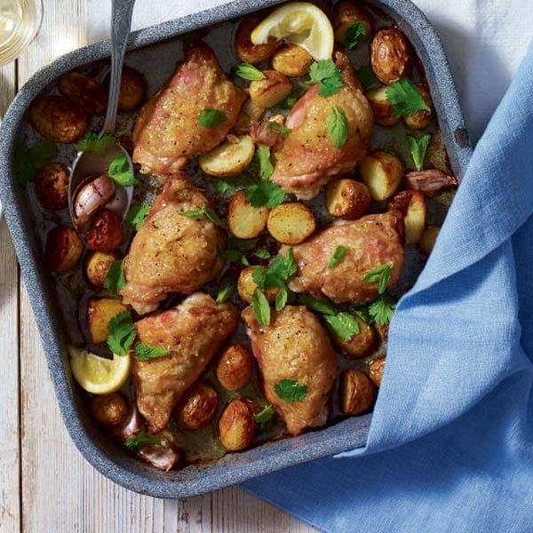 Roast chicken with herbs and new potatoes recipe | delicious. magazine
