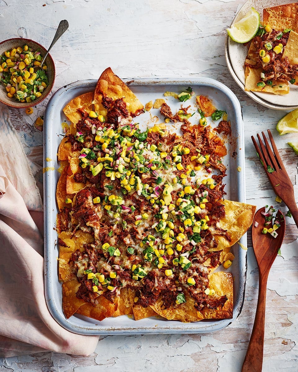 Nachos with pulled pork and sweetcorn salsa recipe | delicious. magazine