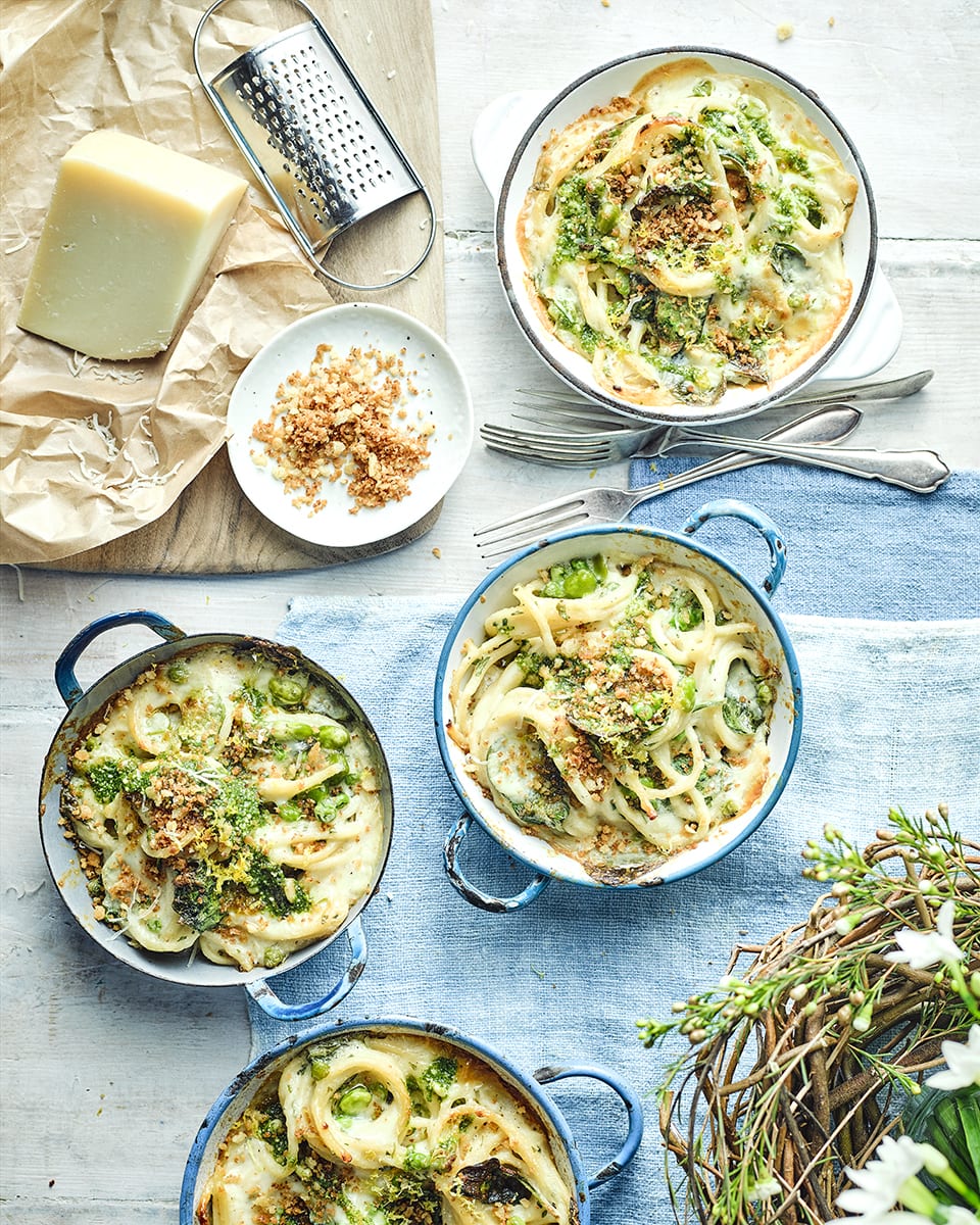 Baked pasta with peas, broad beans, fresh herbs and grana padano recipe |  delicious. magazine