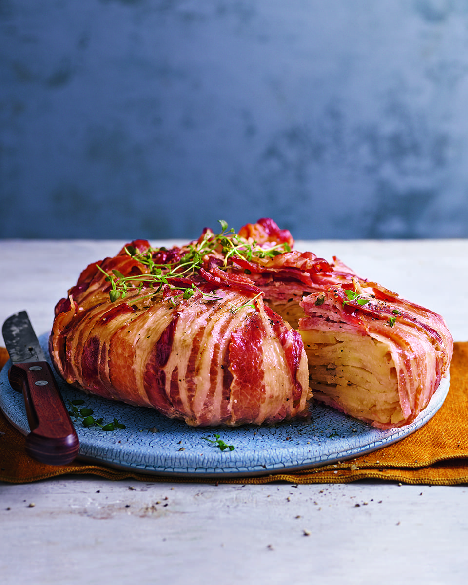 Boulangere Potatoes Wrapped In Streaky Bacon Delicious Magazine