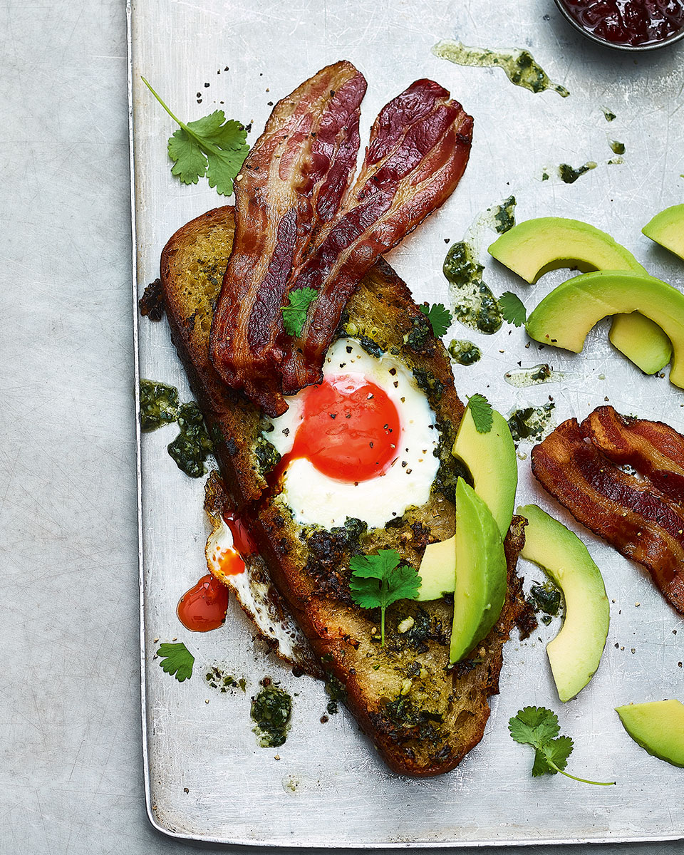 Pesto eggs with sourdough, avocado and bacon delicious. magazine