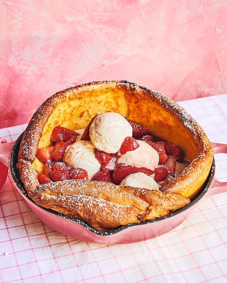 Strawberry dutch baby with strawberry-top syrup