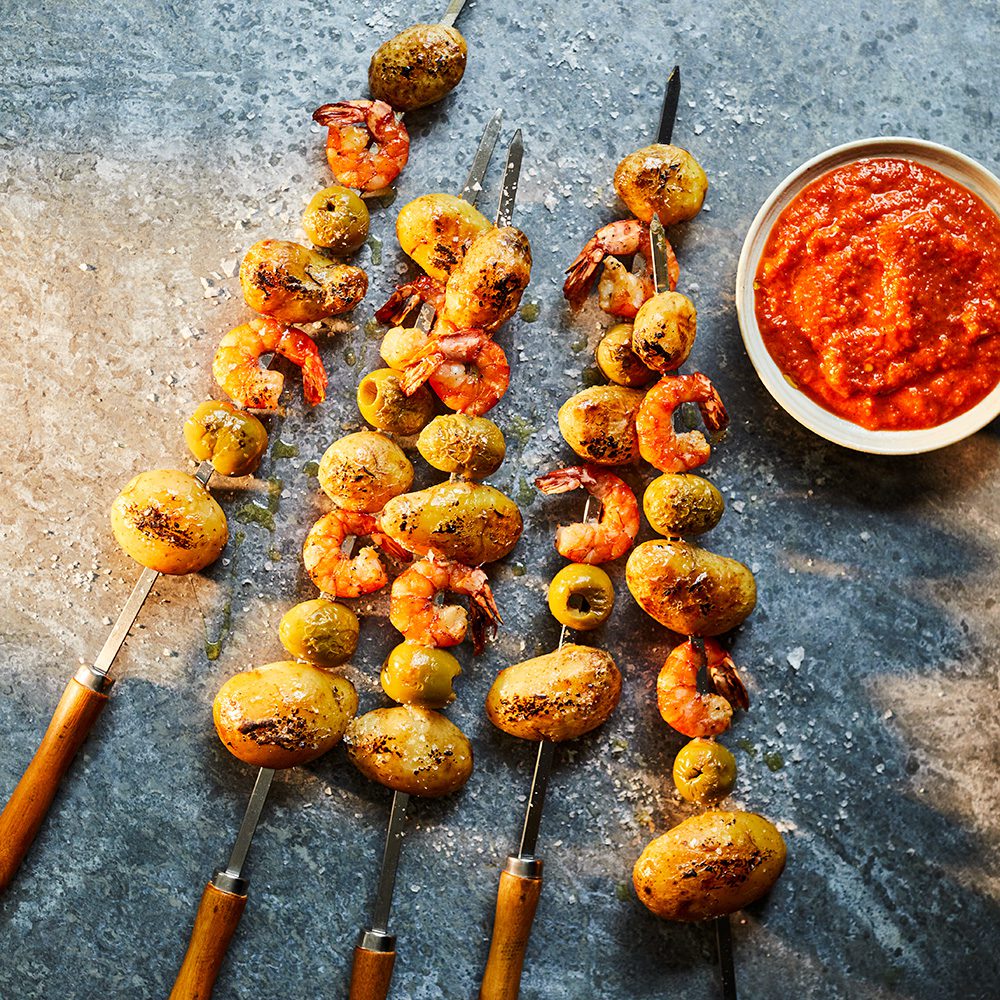 Canarian salted potato and prawn skewers with mojo rojo