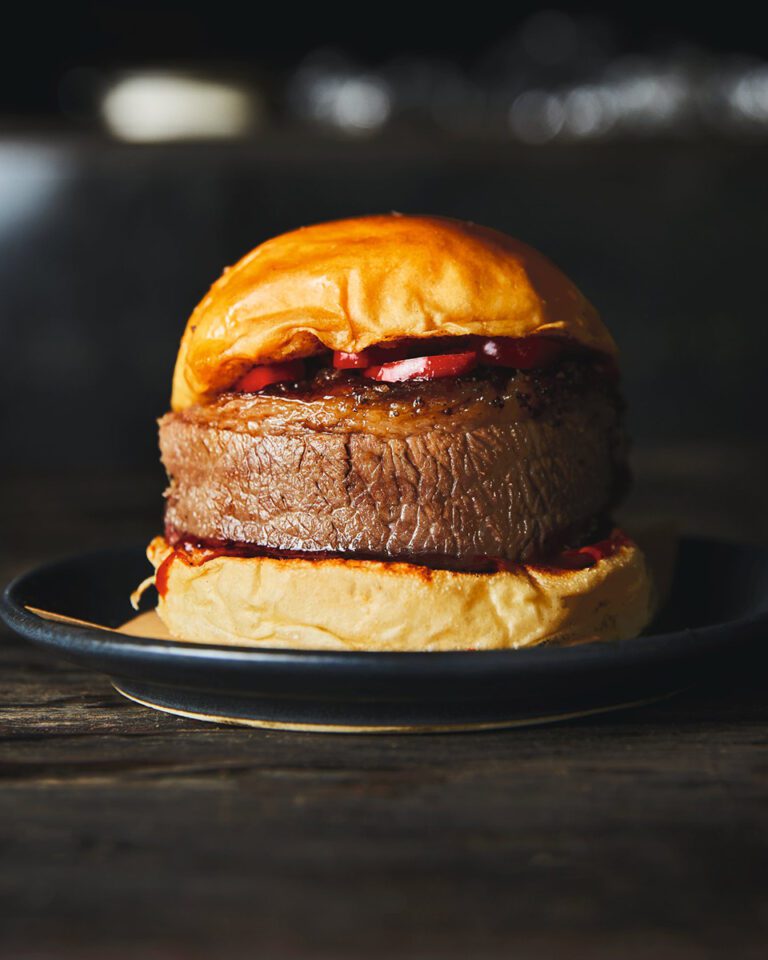 Smoked brisket buns with mustard barbecue sauce and pickled chillies