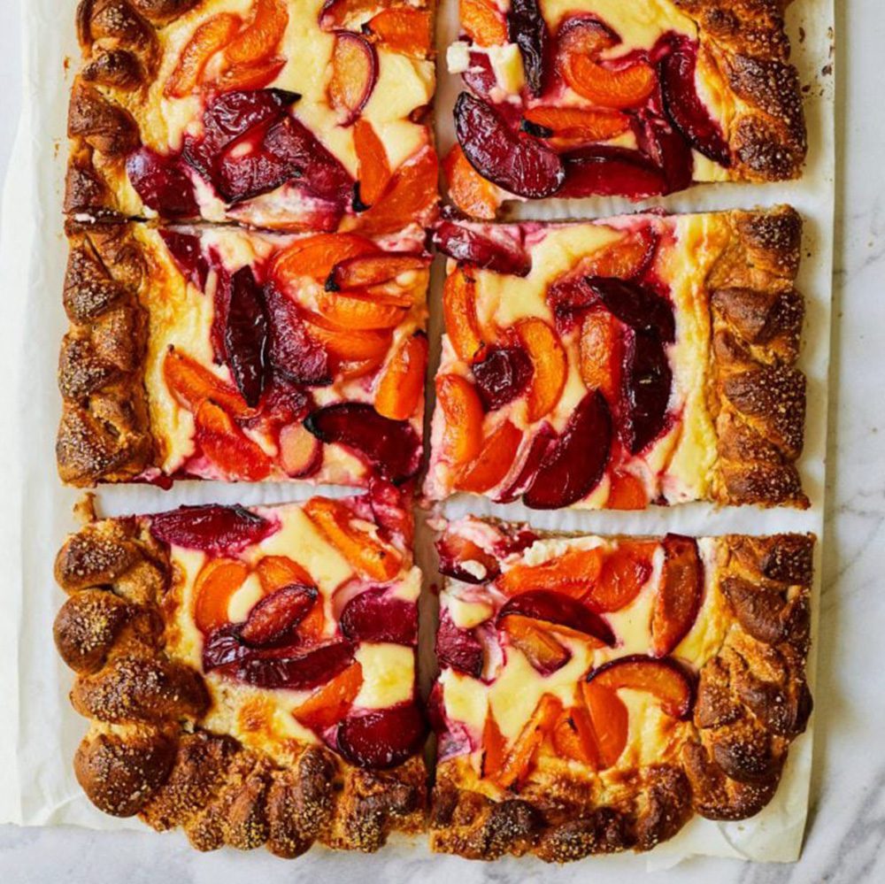 Plum and apricot brioche tart with crème fraîche custard