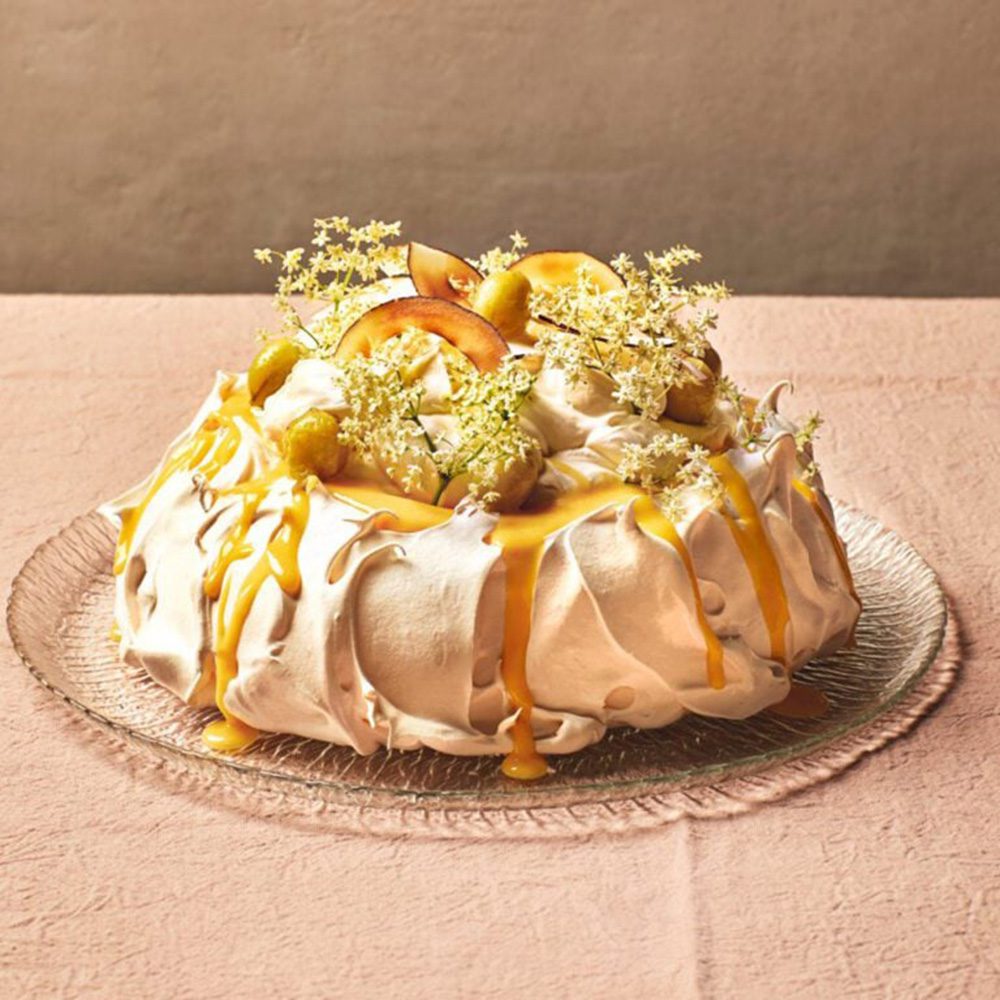 Gooseberry and toasted coconut pavlova