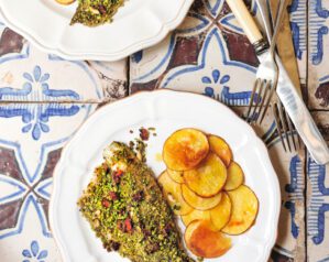 Sea bass with pistachios, pine nuts and sun-dried tomatoes