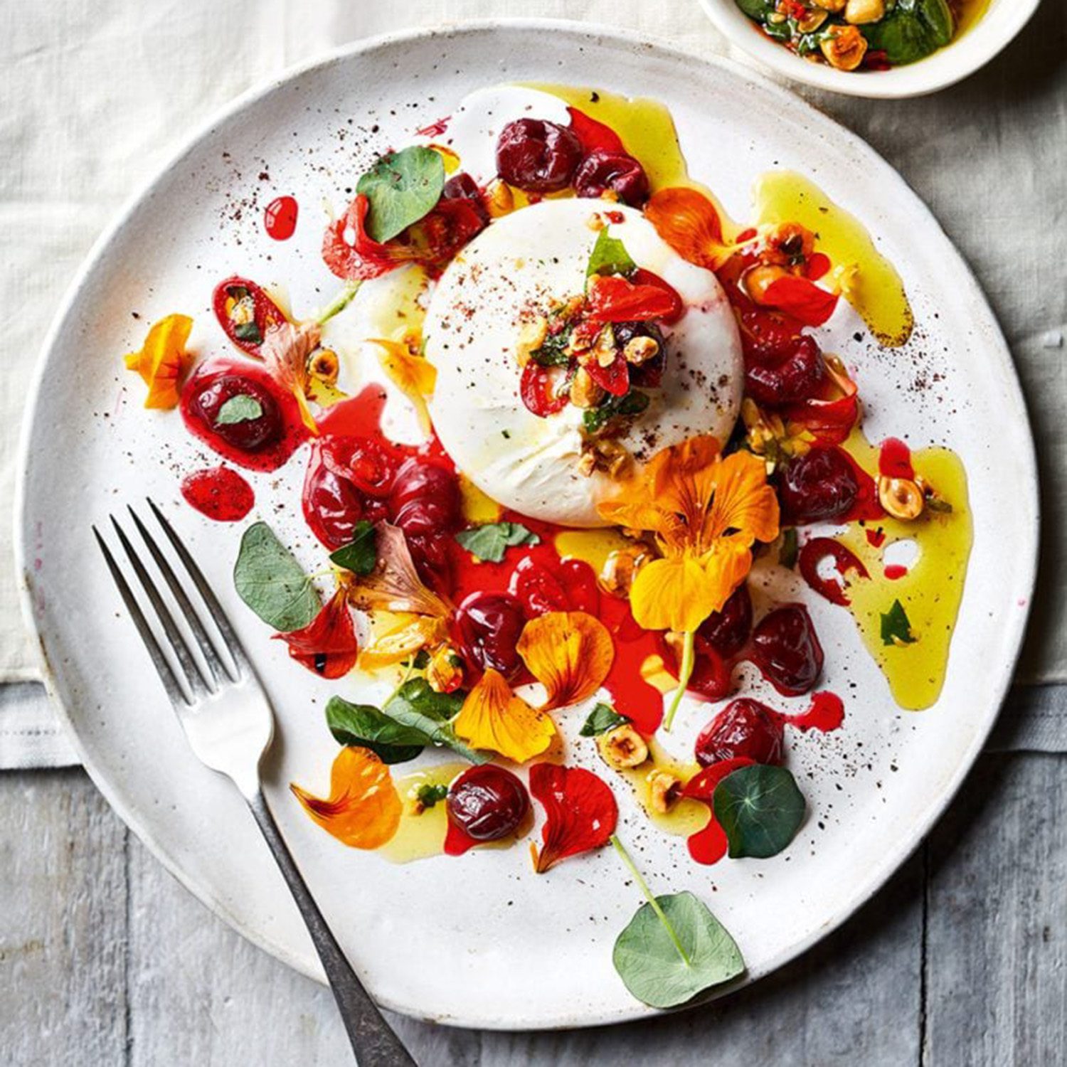 Burrata with pickled cherries and hazelnuts