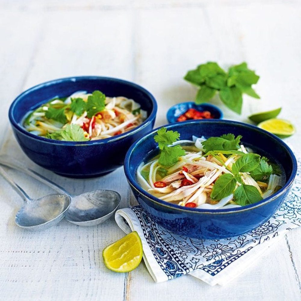 Two bowls of chicken pho